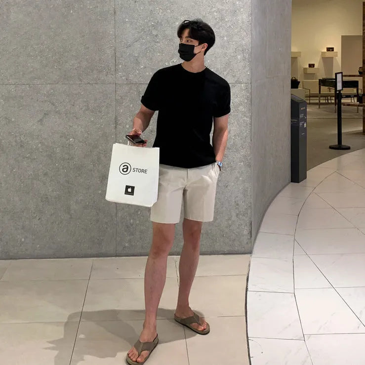 Men's straight-leg casual shorts in solid colour on a plain background.