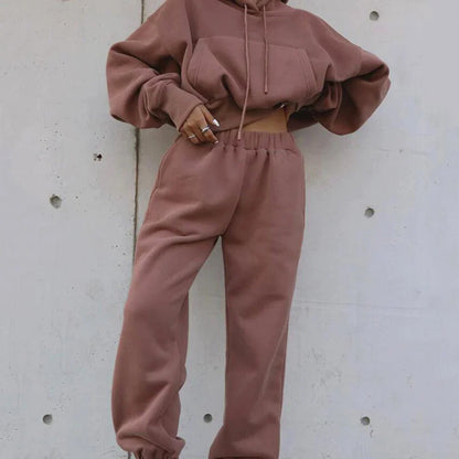 Women's casual hoodie outfit in various colors and sizes, featuring a stylish design and comfortable polyester construction.