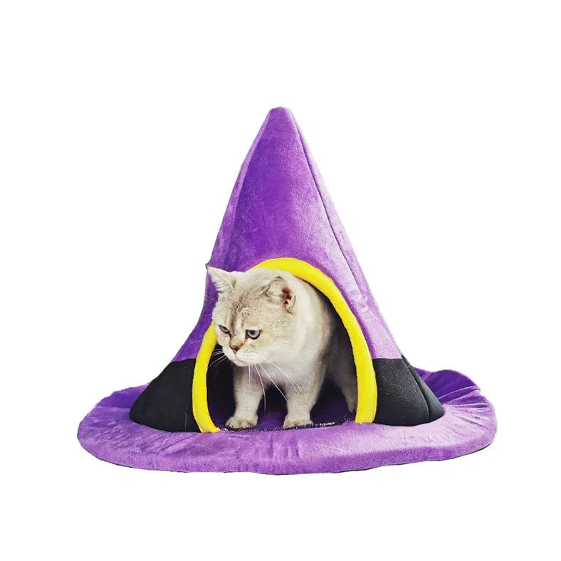 Purple witch hat shaped cat bed measuring 60cm by 45cm with cloth material