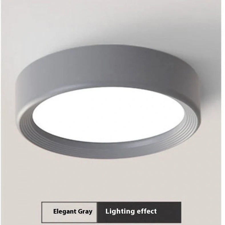 Ultra-thin 1.5cm LED surface mounted downlight in black shell with adjustable colour temperature lighting