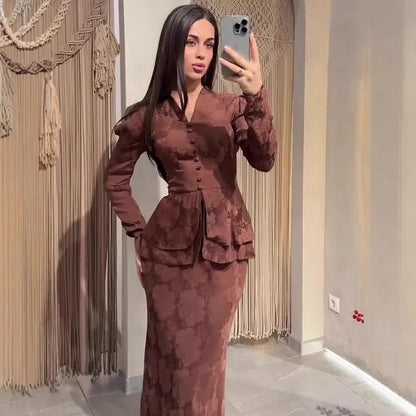 Dark brown retro women's long sleeve dress with floral pattern and button front.