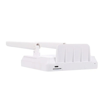 CPF903 white 4G LTE router with two black external antennas attached, alongside USB cable and power adapter.
