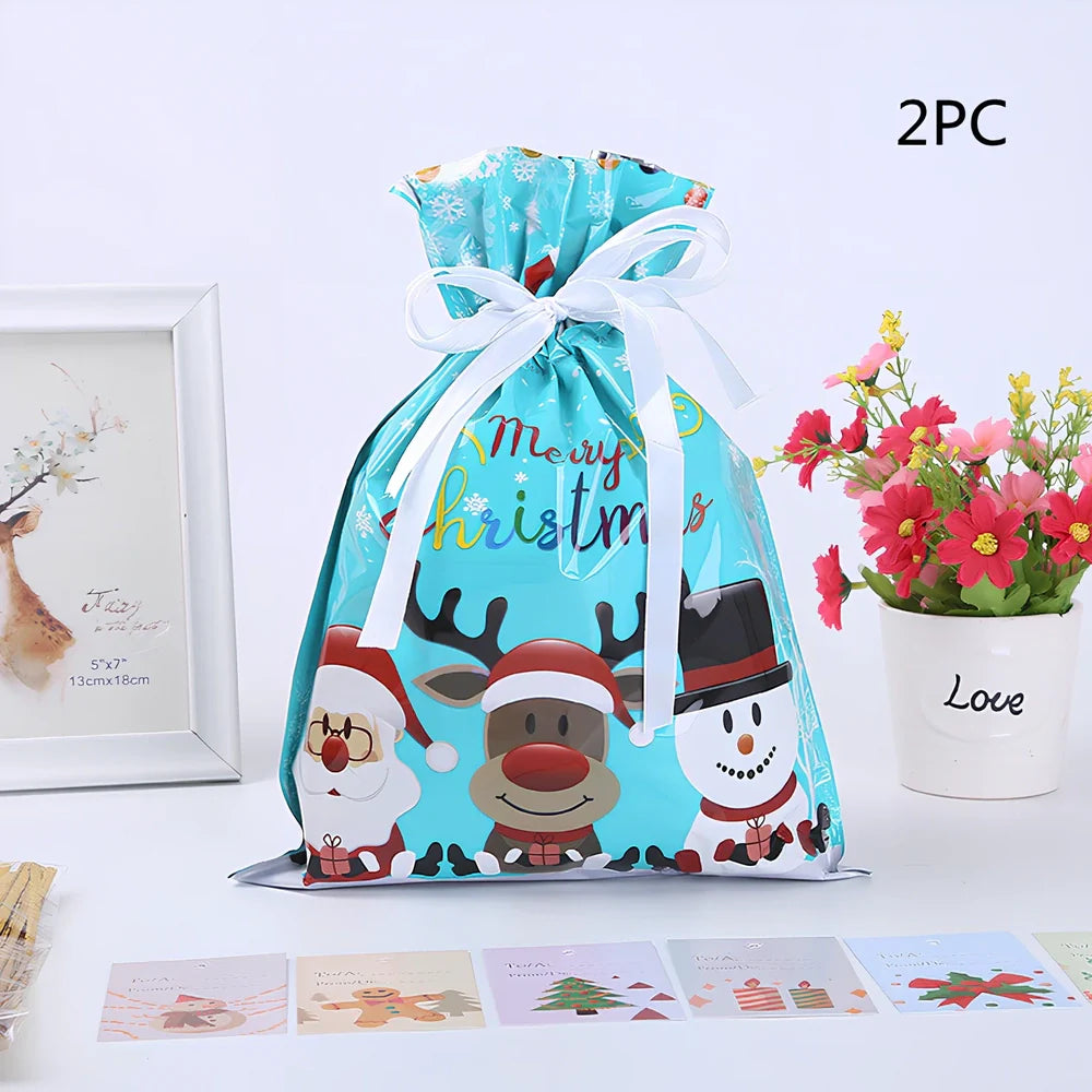 Christmas gift bag with drawstring closure in laser gold finish, 32x24cm dimensions