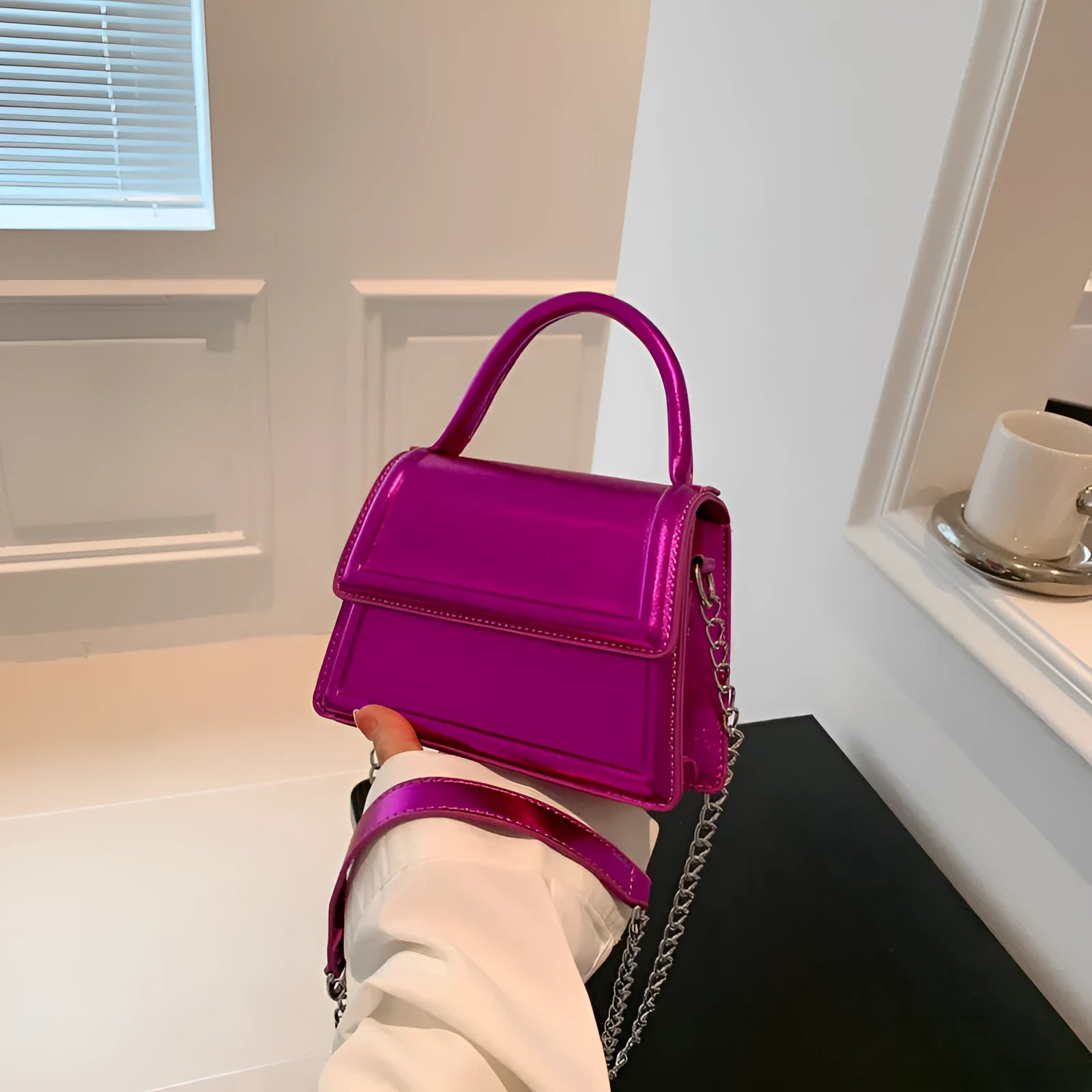 Retro style square PU leather crossbody bag in multiple colours on a model.