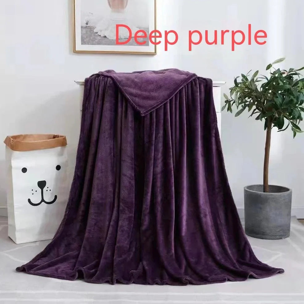 Coral fleece flannel blanket in beige showing textured surface and consistent edges