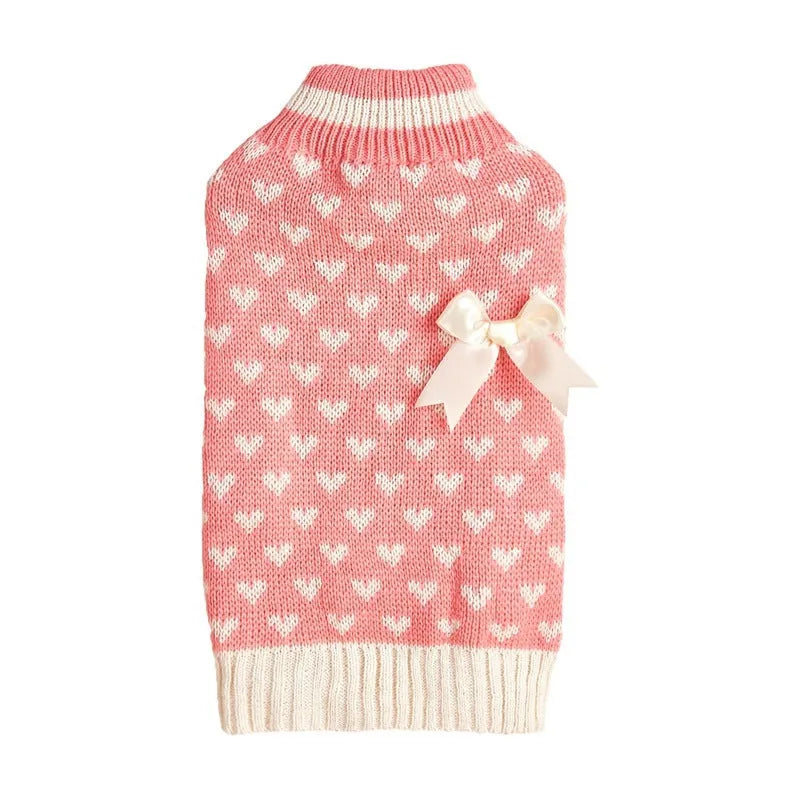 Red love heart pattern dog sweater with pink bow decoration on small dog