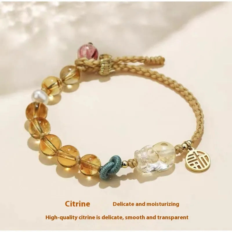 Hand-woven citrine crystal bracelet with animal zodiac designs in natural unisex style