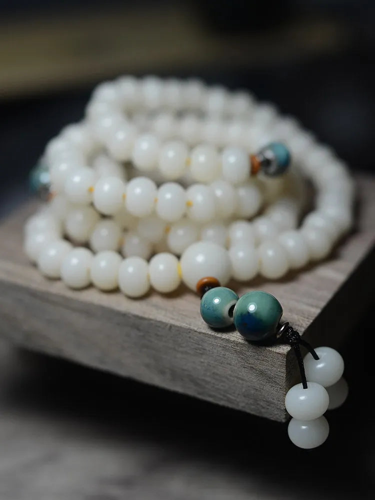 White jade bodhi seed bracelet with 108 flat round oblate beads