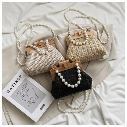 Women's beige straw woven shoulder bag with pearl chain strap, showing horizontal square shape and sewing line detail.
