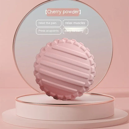 A 6cm diameter pink TPR foot massage ball on a plain background.