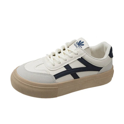 Blue and brown low-top casual sports shoes with round toe and flat rubber sole.