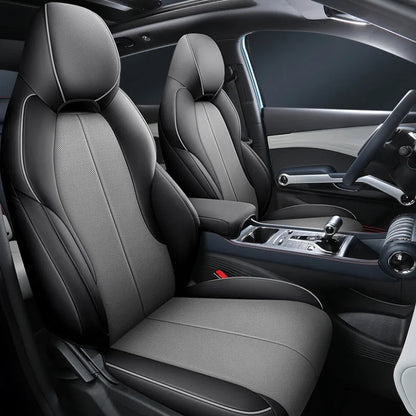 Yuan PLUS car seat cushion cover in grey, showing tailored fit on vehicle seat.