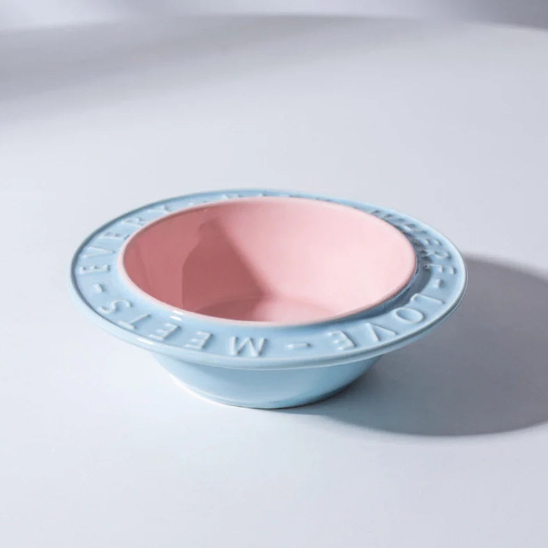 Ceramic cat bowl with iron anti-tip frame in blue colour with silicone pad