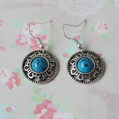 Handmade Miao silver retro turquoise flower disk earrings with geometric totem patterns