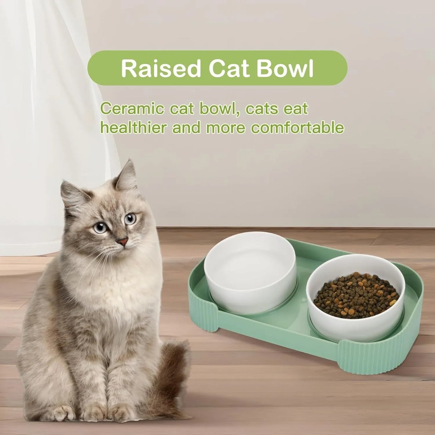 Green ceramic raised cat feeder with two tilted bowls on a non-slip white stand.