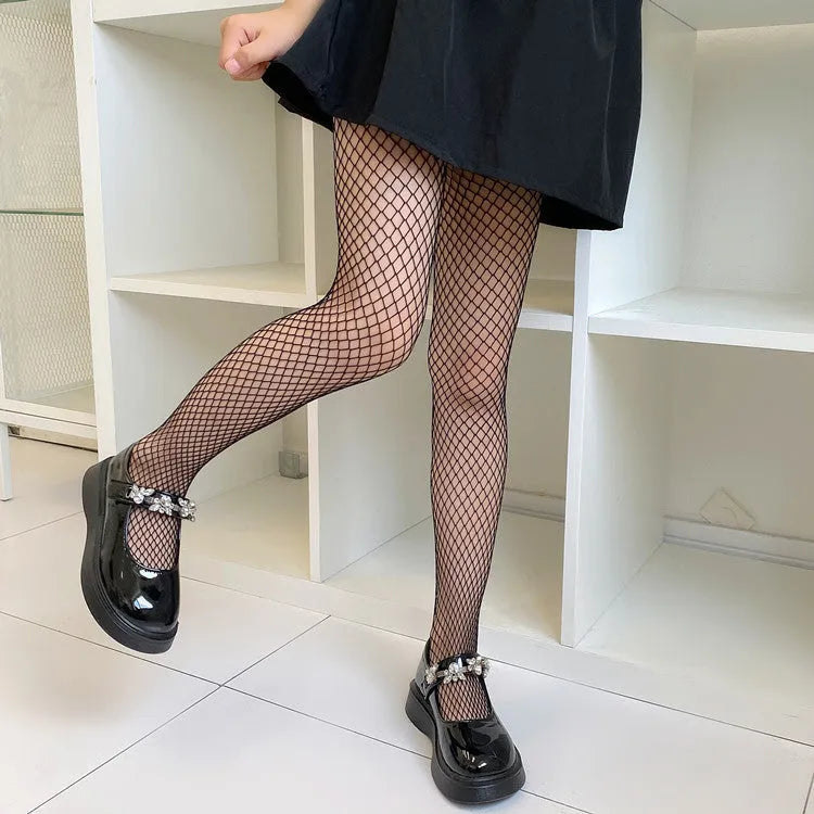 Women's black and white mesh stockings showing large, medium, and small hole patterns.