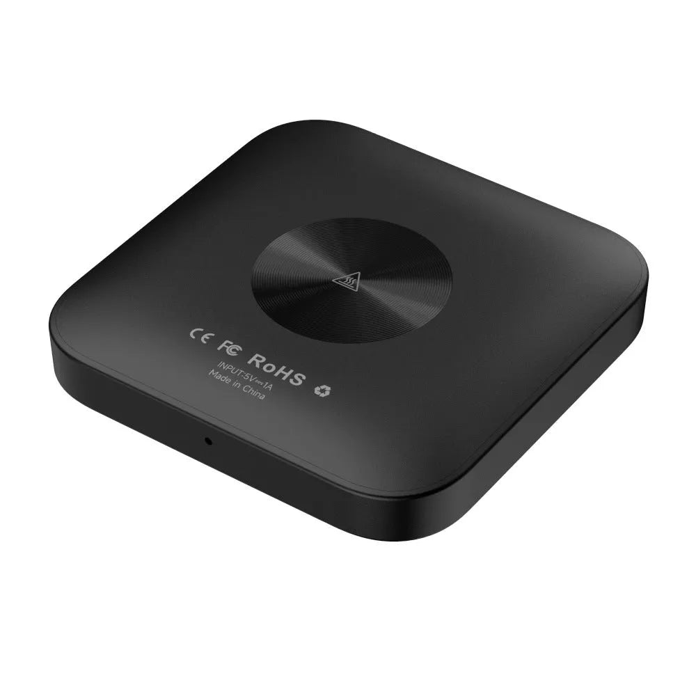 Square-shaped wireless CarPlay adapter box for cars with Android 13 system.