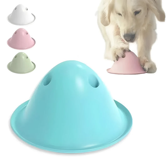 Green interactive dog chew puzzle toy with hidden treat slots on a flat base.