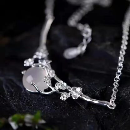 White gold colour copper necklace with moonlight white chalcedony inlay, cross chain, and moon shadow cold plum design