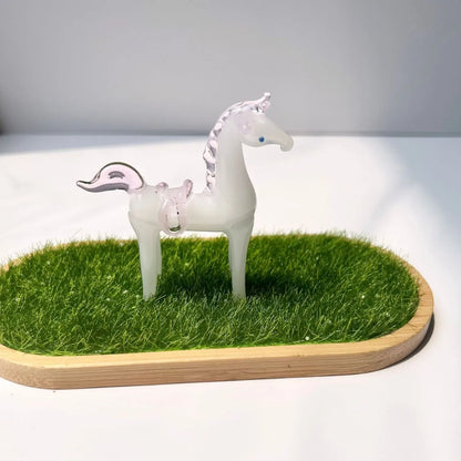 Brown glazed horse decoration on wooden desk with modern minimalist design and glossy finish