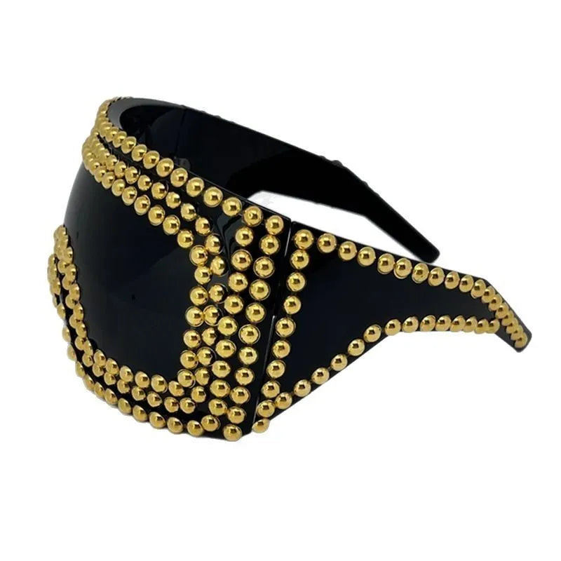 Square punk sunglasses with large rim and rivet detailing in gold colour