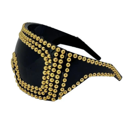 Square punk sunglasses with large rim and rivet detailing in gold colour
