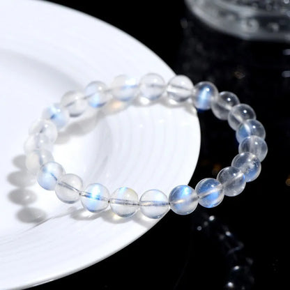 Natural cream body blue moonlight crystal bracelet with grinding texture, unisex design, sizes 4mm to 10mm