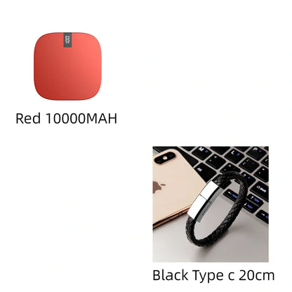 Red 10000 mAh mini power bank with digital display showing battery percentage, measuring 90x64x24mm