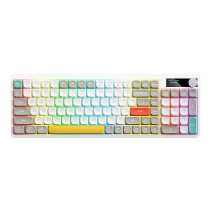 Black iron cow layout mechanical keyboard with RGB backlighting on a desk.