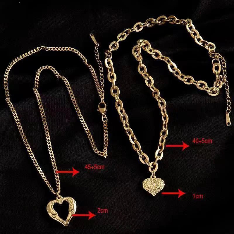 Stylish Titanium Steel Angel Wings Heart Necklace for Women in silver and golden finishes.
