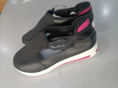 Breathable mesh sneakers with low-profile wedge heel and non-slip rubber outsole, available in red, black, blue, and pink colors