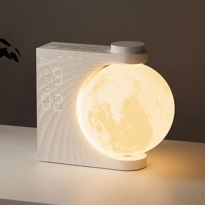 Moon Light Clock with wake-up light and dual alarm features on bedside table