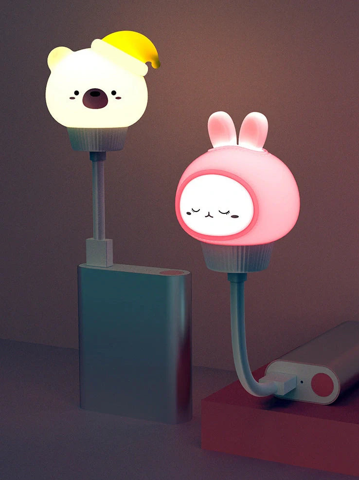 USB portable LED night light with cartoon animal design showing three brightness levels and remote control