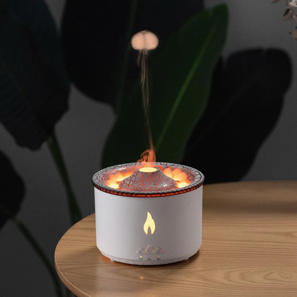 Colourful volcano-shaped cool mist humidifier with aromatherapy tray and flame-effect night light.