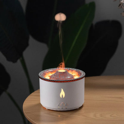 Colourful volcano-shaped cool mist humidifier with aromatherapy tray and flame-effect night light.