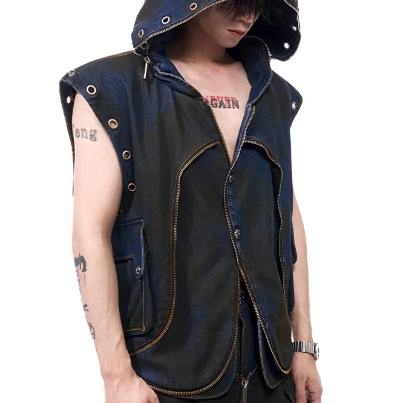 Blue hooded denim vest coat with front zip worn with matching trousers in a two-piece set.