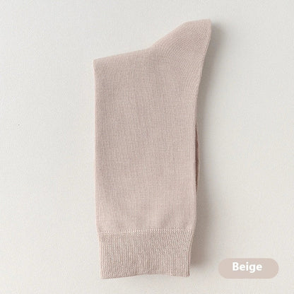 Mid-calf business socks in solid colours with combed cotton construction and deodorant function