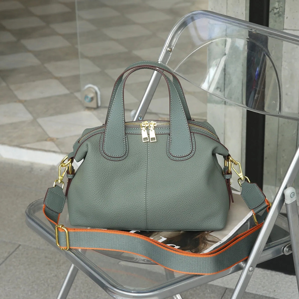 Women's genuine leather cross-body shoulder bag in horizontal square design with multiple internal compartments