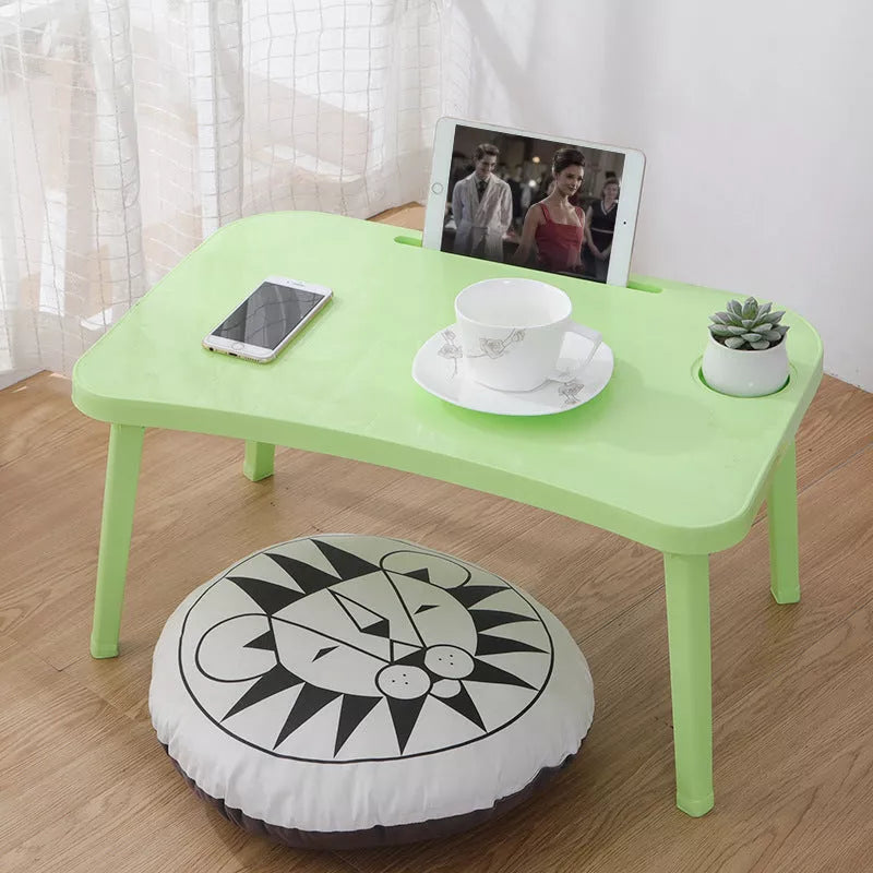 Foldable bed table in Nordic colors for portable computing