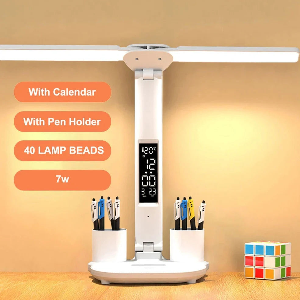 White LED desk lamp with calendar display, touch controls, and integrated pen holder on wooden desk