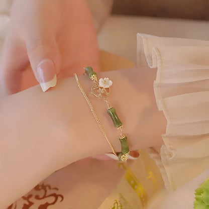 Natural olivine double layer bracelet with olive branch charms on wrist