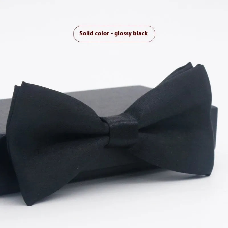 Flat-head self-tie bow tie in a wine red colour, showing its 12cm width and 6cm height dimensions.