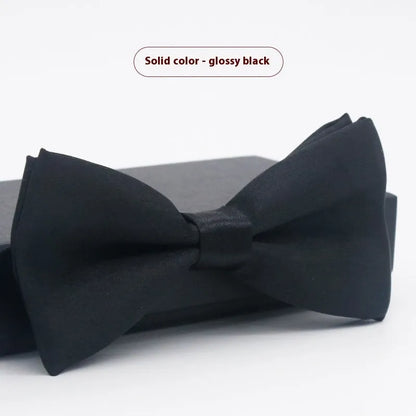 Flat-head self-tie bow tie in a wine red colour, showing its 12cm width and 6cm height dimensions.