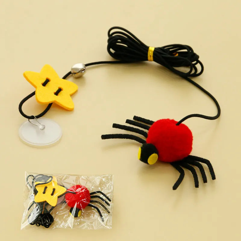 Cat toy hanging from door with elastic rope, colourful feather, bell and soft spider decoration