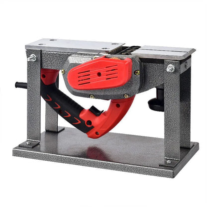 Red desktop electric wood planer with aluminium shell showing 82mm planing width