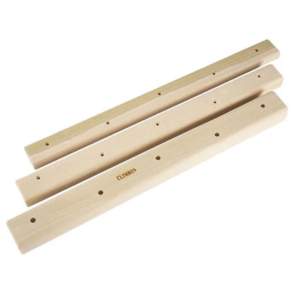 Three solid wood hangboards for grip strength training showing different edge depths and lengths