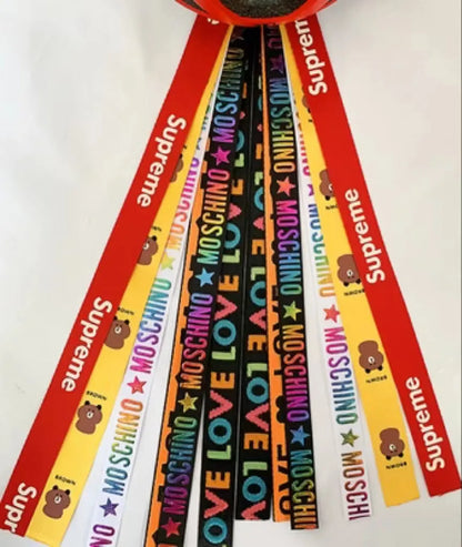 Children's helmet streamer with 60 cm polyester ribbon in colours like apricot and khaki for roller skating and skiing