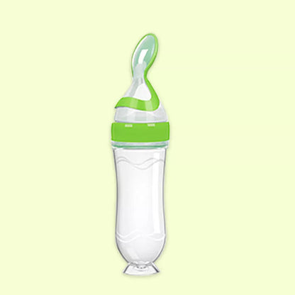 Silicone baby rice paste spoon feeding bottle with suction cup in blue, green, pink, yellow, and white