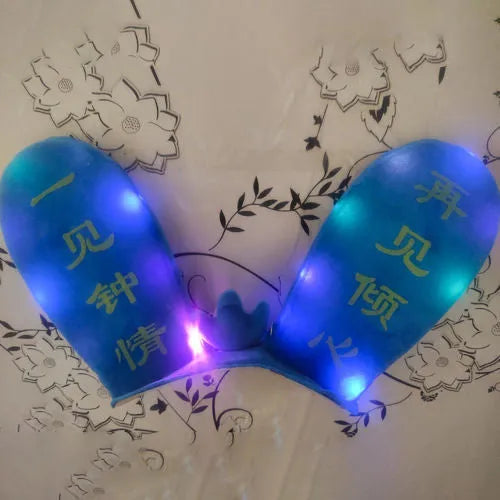 Rabbit ear ski helmet ornament with LED lighting and Velcro base attachment for helmet customisation