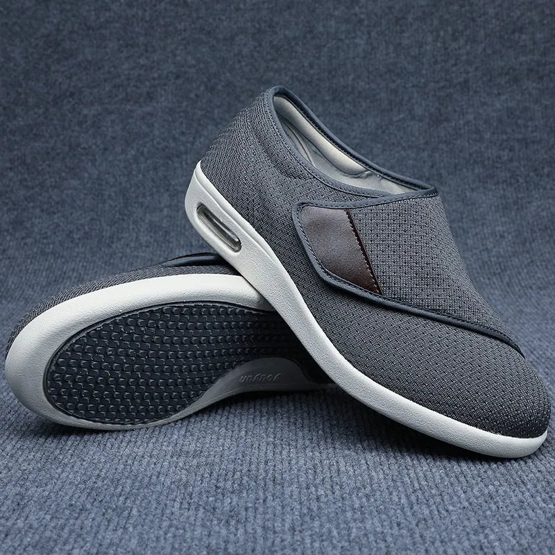 Beige leisure shoes for elderly with Velcro strap and rubber foam sole.